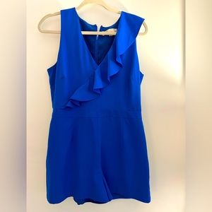 Royal blue, ruffle front Adelyn Rae romper. Size L